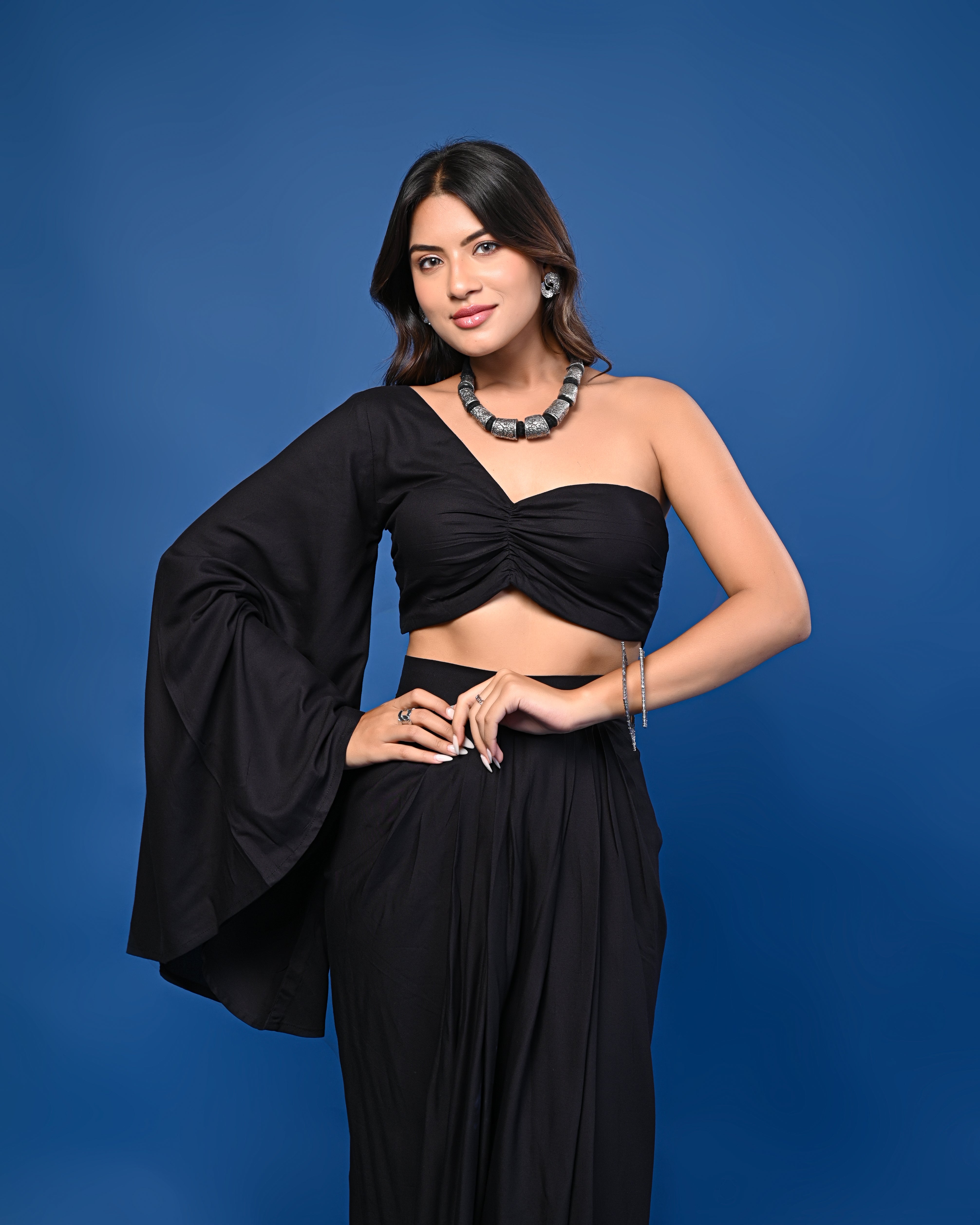 Black One-Shoulder Crop Top with Pleated Black Skirt